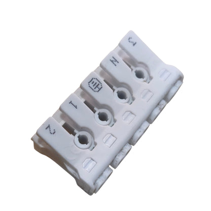 White plastic component with multiple holes on a white background