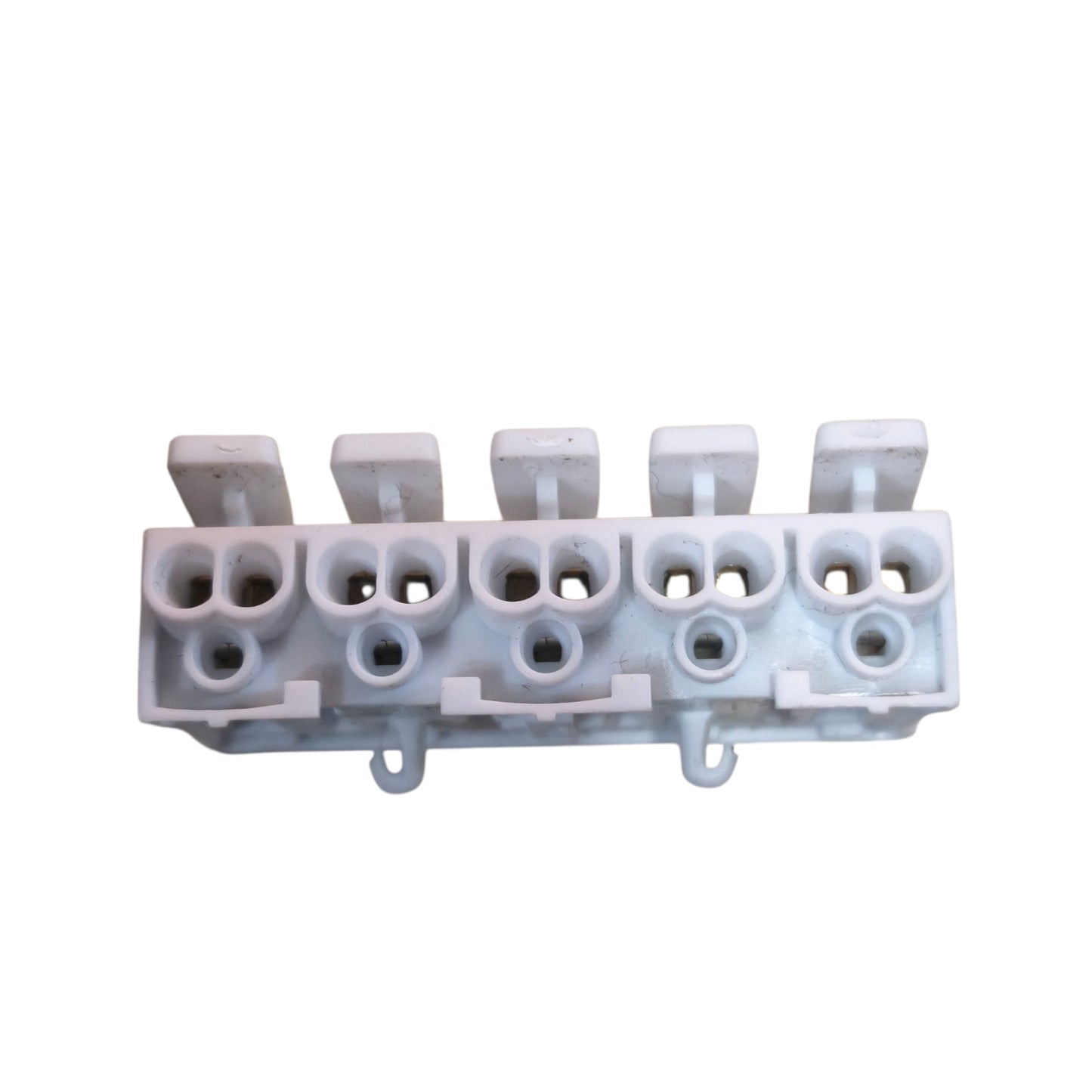 White plastic connector with multiple slots on a white background