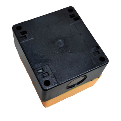 A square black plastic electrical junction box or terminal block with a yellow-orange base, shown on a plain white background.