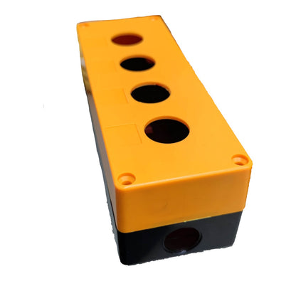 A rectangular plastic component with a bright orange top half and a black bottom half, featuring four circular openings on the top surface and one opening on the side, shown on a plain white background.