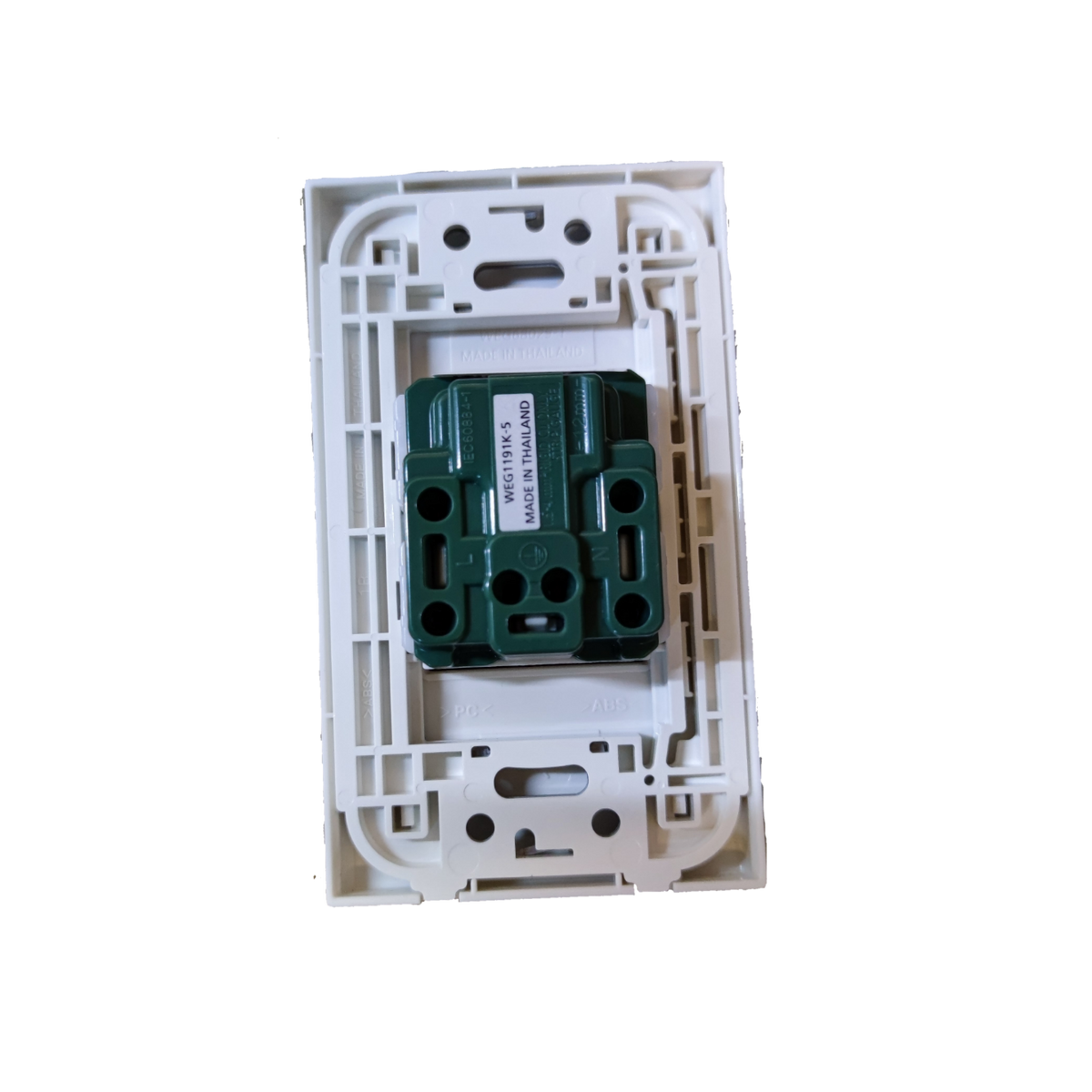 Panasonic 250V quick connect electrical socket green insert mechanism mounted in white wall plate frame
