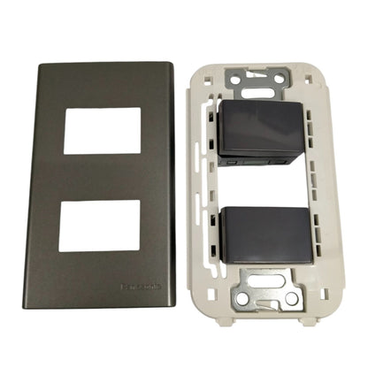 Panasonic 2 gang 4 way switch with black toggle switches and matching faceplate