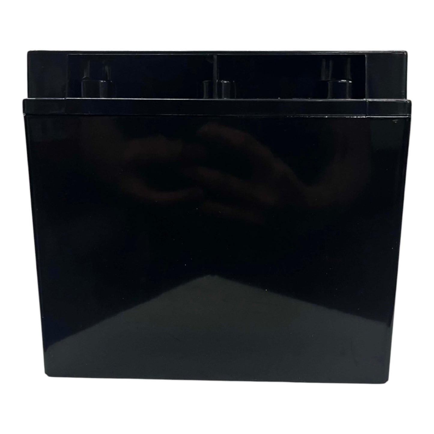 A glossy black rectangular plastic battery or container with a reflective surface, shown against a plain white background.