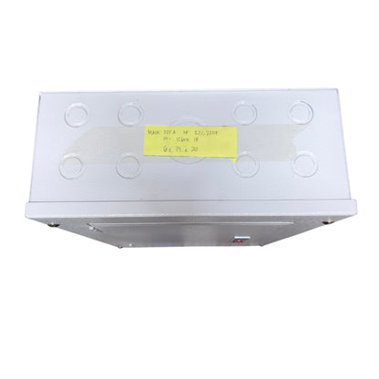 A rectangular silver metal electrical junction box with circular screw holes on top, featuring a yellow handwritten label on the front, set against a plain white background.