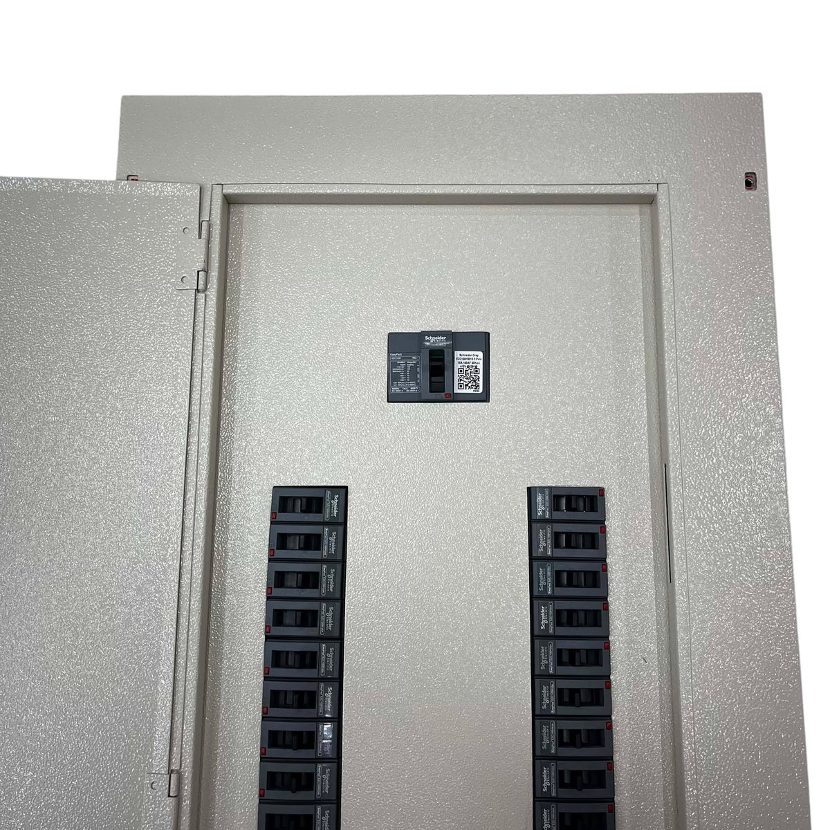 A large industrial electrical panel with a textured light gray exterior and interior, featuring multiple black circuit breakers arranged in two vertical columns and a small lockout/tagout card mounted near the top center.