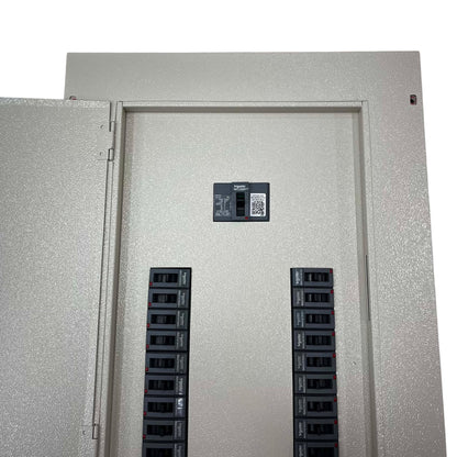 A large industrial electrical panel with a textured light gray exterior and interior, featuring multiple black circuit breakers arranged in two vertical columns and a small lockout/tagout card mounted near the top center.