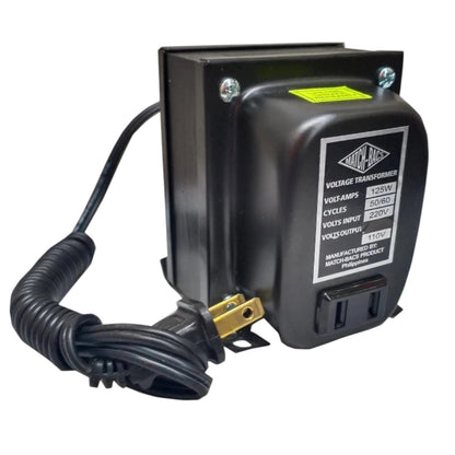 A black voltage transformer power supply with a coiled black cord and a gold-toned plug, featuring a white label with specifications and a yellow sticker on the side.