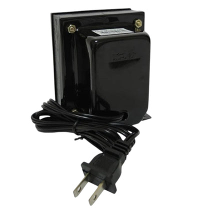 A black electrical transformer or power adapter with a coiled black power cord and a two-prong US plug, shown against a plain white background.