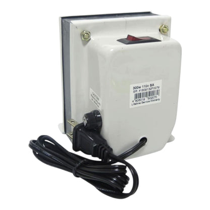 A white electrical transformer or power supply with a black power cord, a black rotary switch, and a red switch lever, shown on a white background.