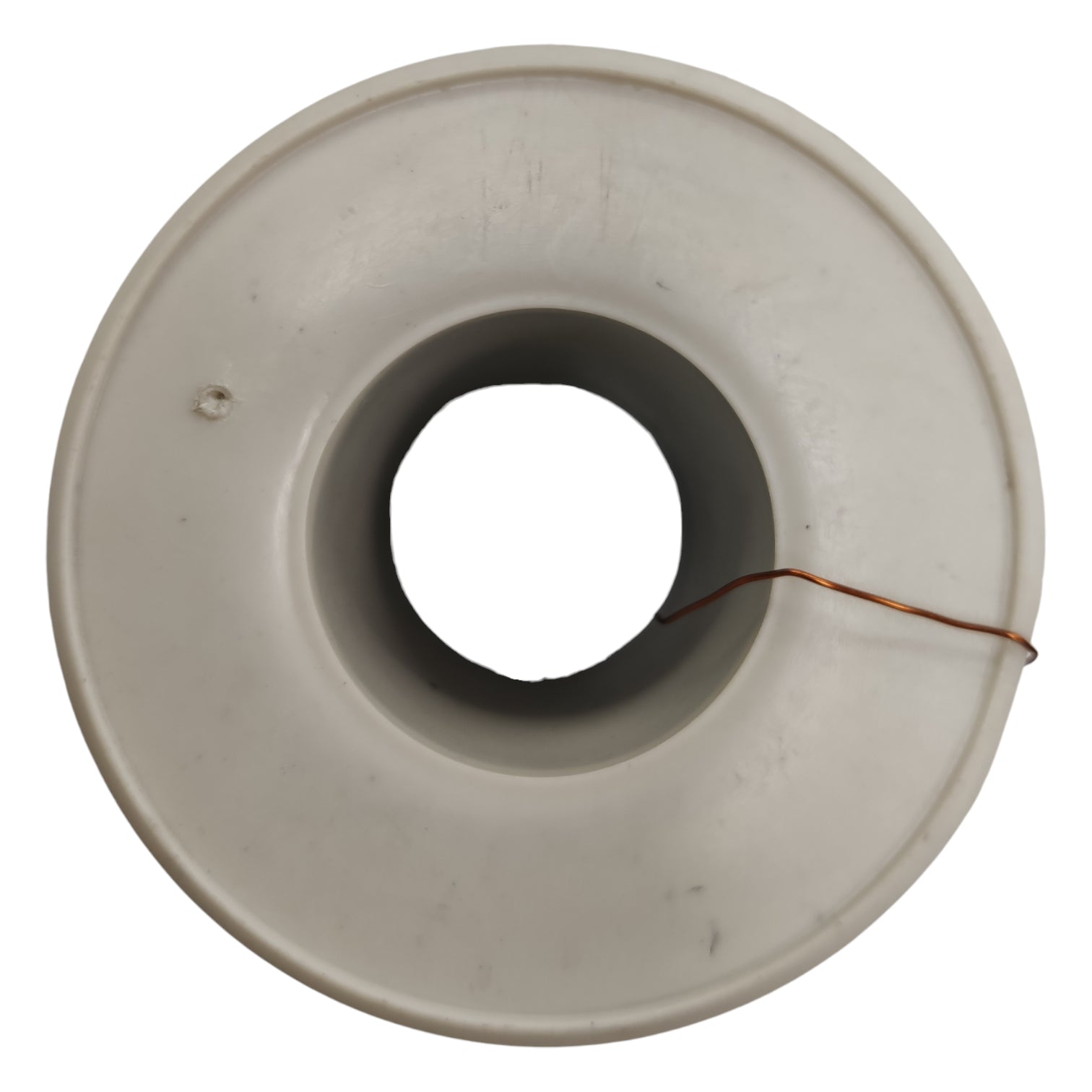 Round metallic component with a central hole on a white background