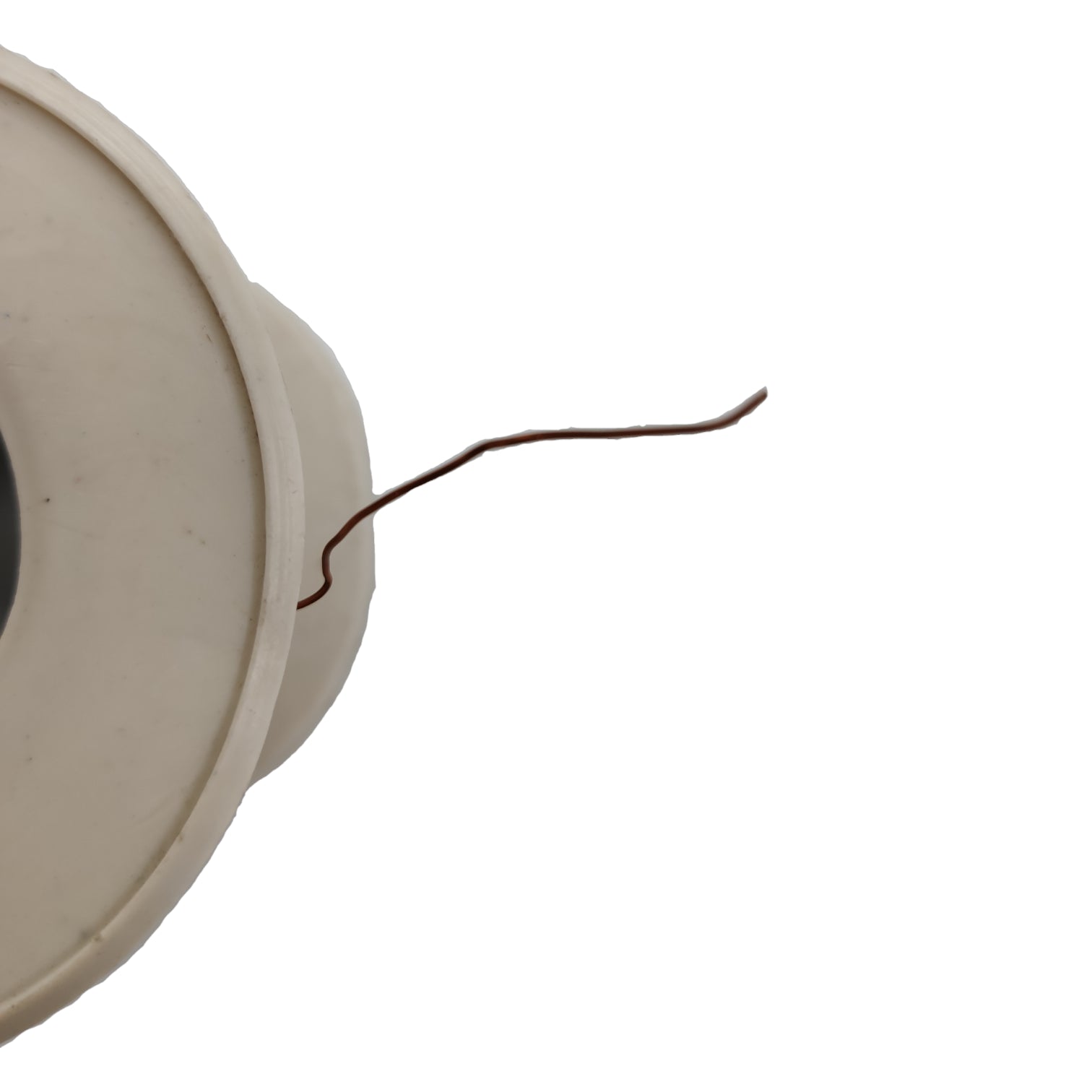 Close-up of a beige circular object with a thin wire on a white background Philflex 400 Grams Magnet Wire AWG 33 Enameled Copper Wire 0.18mm Heavy Formix Approx 1600 Meters Per Roll Electx Electrical supply