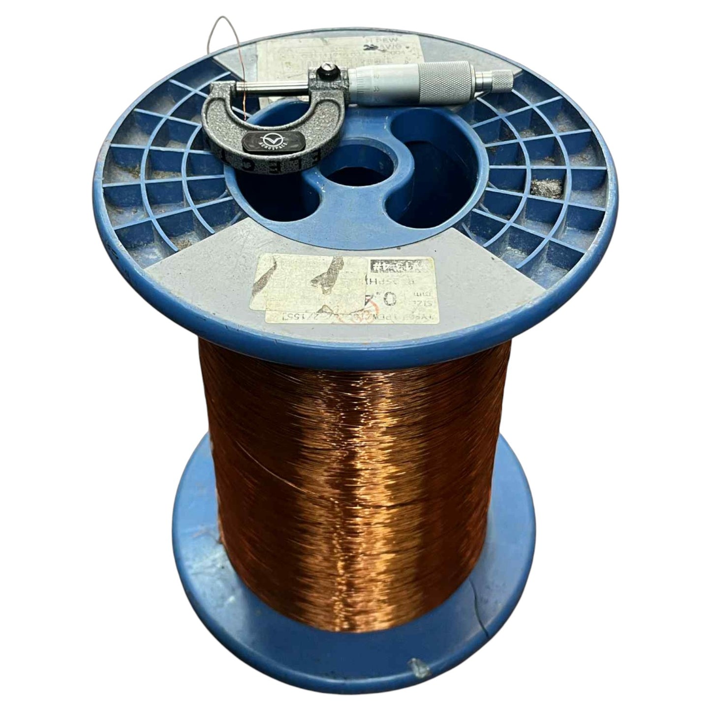 Spool of copper wire on a blue reel with visible brand name. Philflex 600 Grams Magnet Wire AWG 26 Enameled Copper Wire 0.40mm Heavy Formix Approx 495.87 Meters Per Roll Electx Electrical Supply