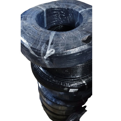 A stack of large black wire or cable reels wrapped in clear plastic, photographed against a plain white background.