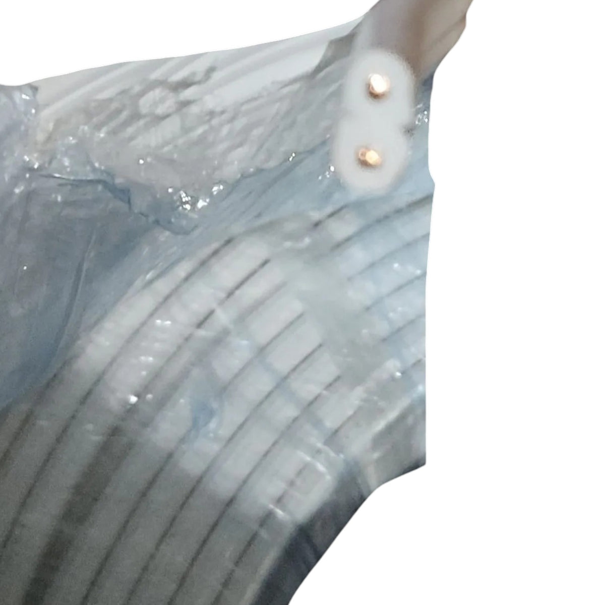 A close-up of a translucent light blue striped garment or fabric with two small metallic gold buttons on a white background.