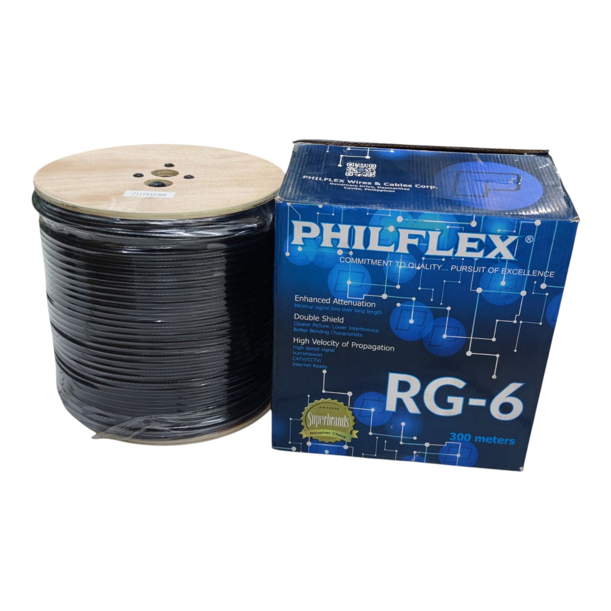 A spool of black RG-6 shielded Ethernet cable next to its blue and white PHILFLEX branded retail box on a white background.