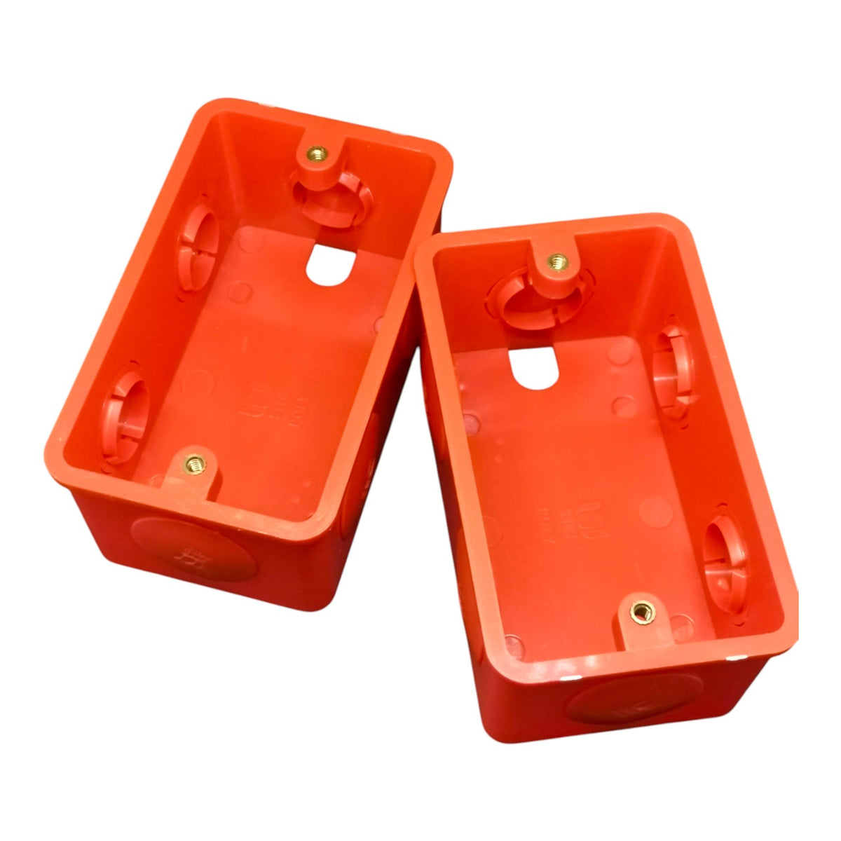 Two bright orange plastic electrical junction boxes shown on a plain white background.