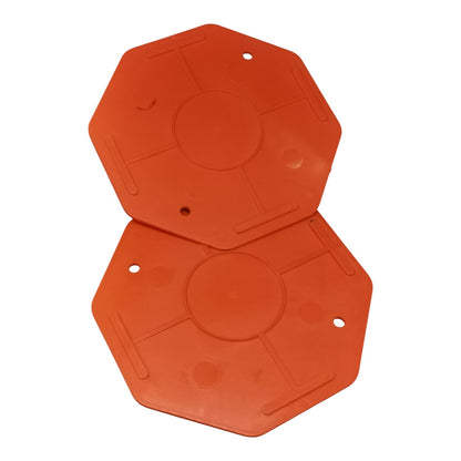 Two orange hexagonal plastic pads with circular center designs and small mounting holes, shown overlapping on a white background.