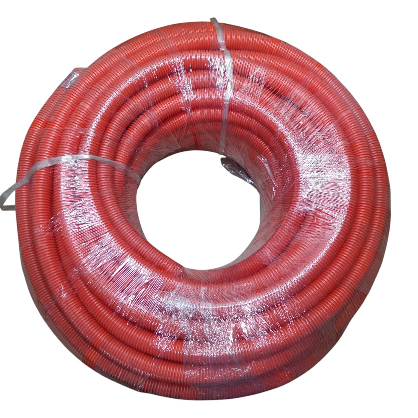 Coiled red hose on a white background
