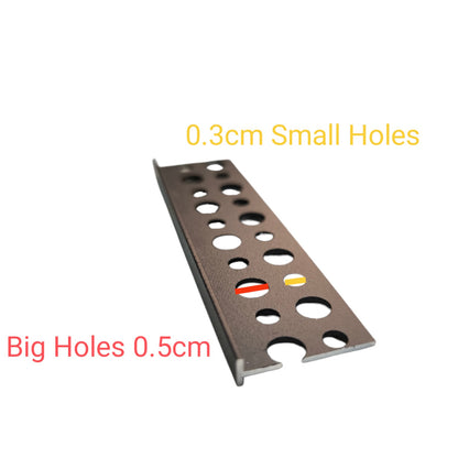 A metal bracket with circular and oval cutouts, shown on a white background with text labels reading '0.3cm Small Holes' and 'Big Holes 0.