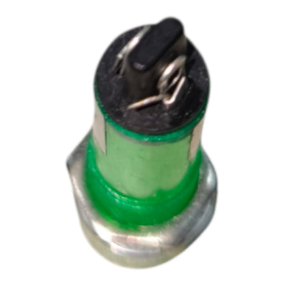 A small cylindrical electronic component with a green plastic body, a black top terminal, and a silver metal base, isolated on a white background.
