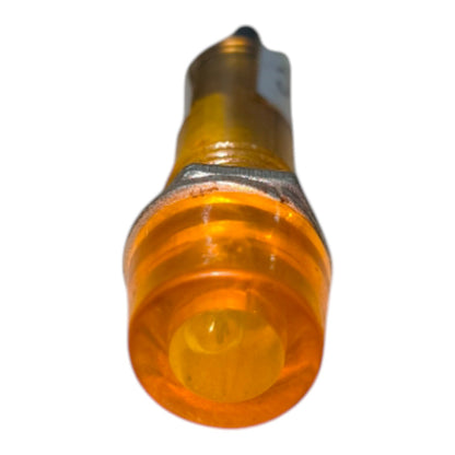 An amber orange translucent plastic light component with a silver metal band near the top, isolated on a white background.