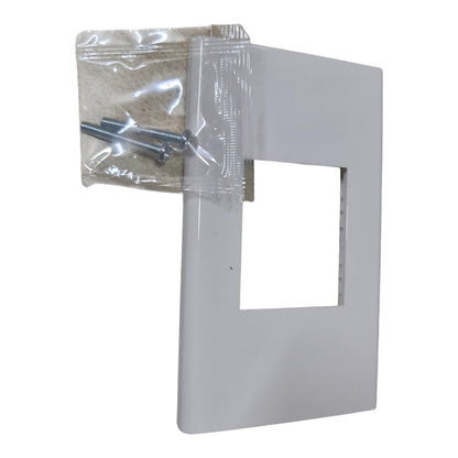 White rectangular wall plate cover with a square cutout, shown with a small clear plastic bag of mounting screws on a white background.