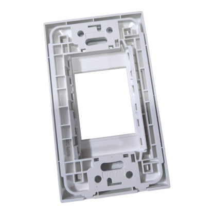 A white plastic electrical outlet cover plate frame, shown from an angled perspective against a plain white background.