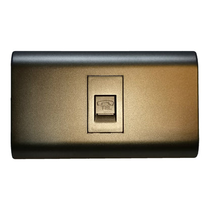 A modern wall-mounted RJ45 network module with a textured metallic finish in a bronze color, featuring a recessed center with a standard telephone plug.