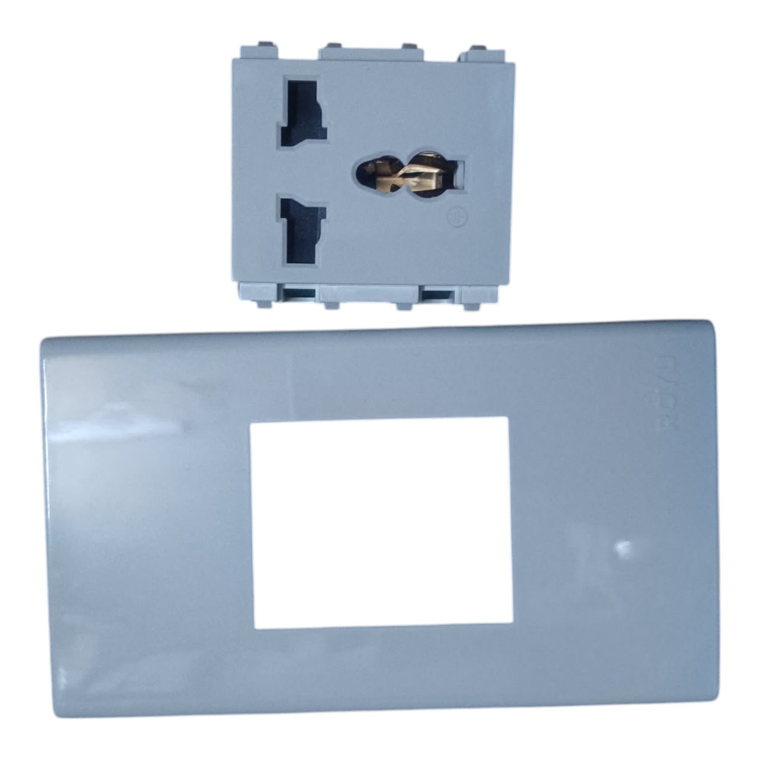 A light blue-gray plastic electrical outlet cover plate shown with its corresponding rear socket assembly on a plain white background.