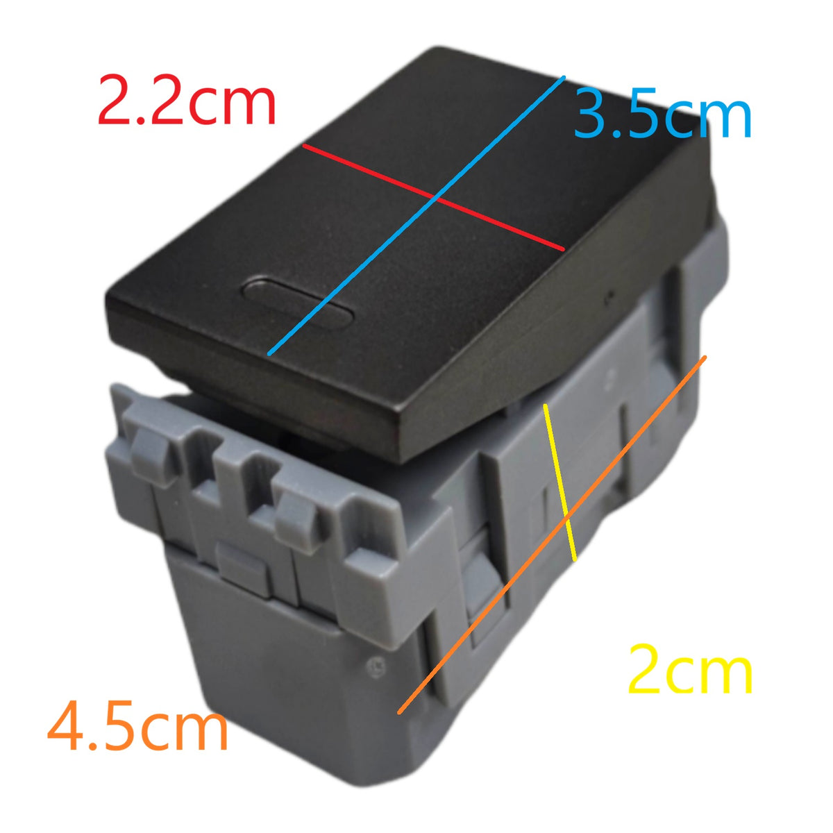 A small black and gray plastic component shown on a white background with overlaid dimension labels in red, blue, orange, and yellow indicating measurements such as 2.2 cm, 3.