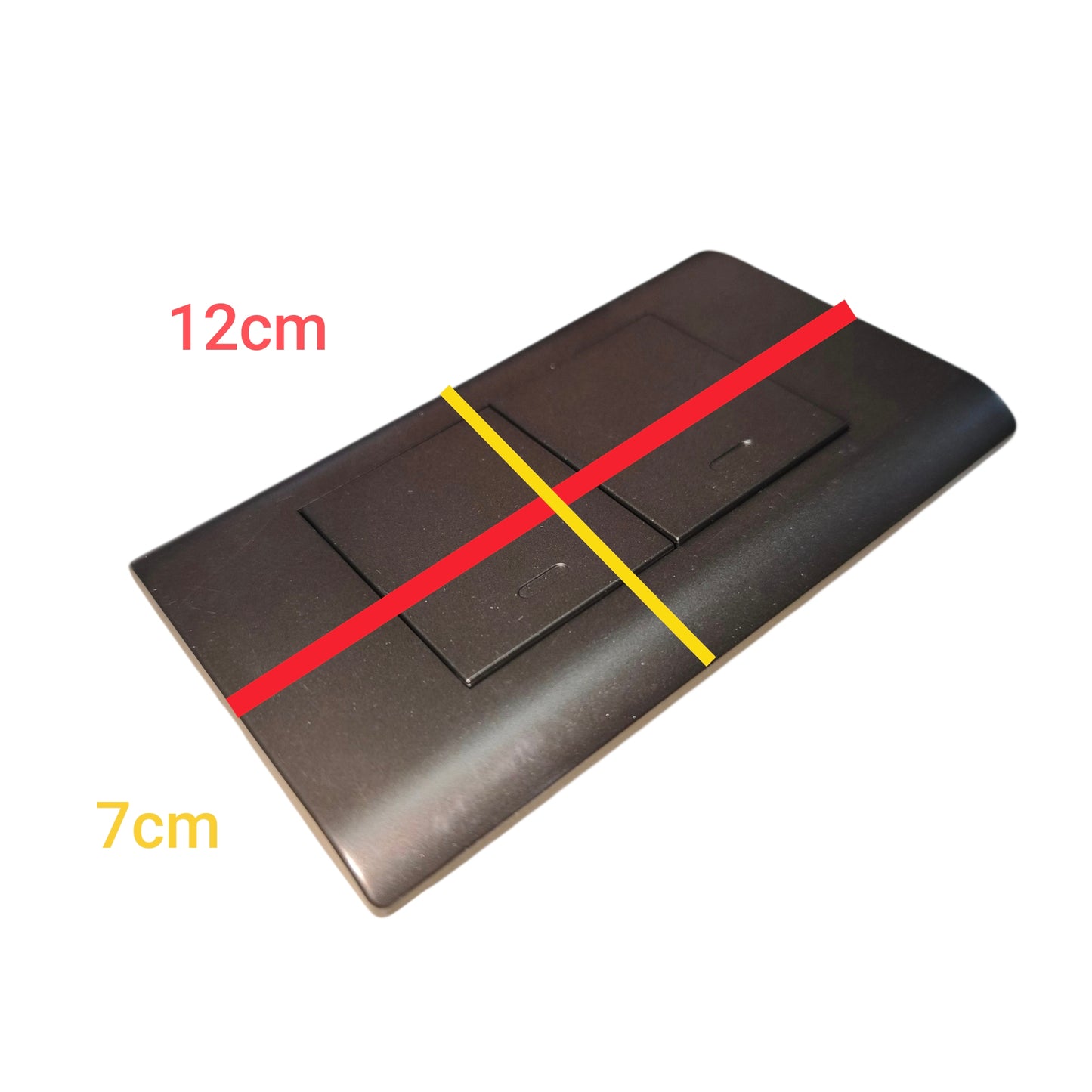 A dark brown rectangular electronic device, likely a remote control or switch panel, shown with red and yellow measurement lines and text indicating dimensions of 12cm and 7cm on a white background.