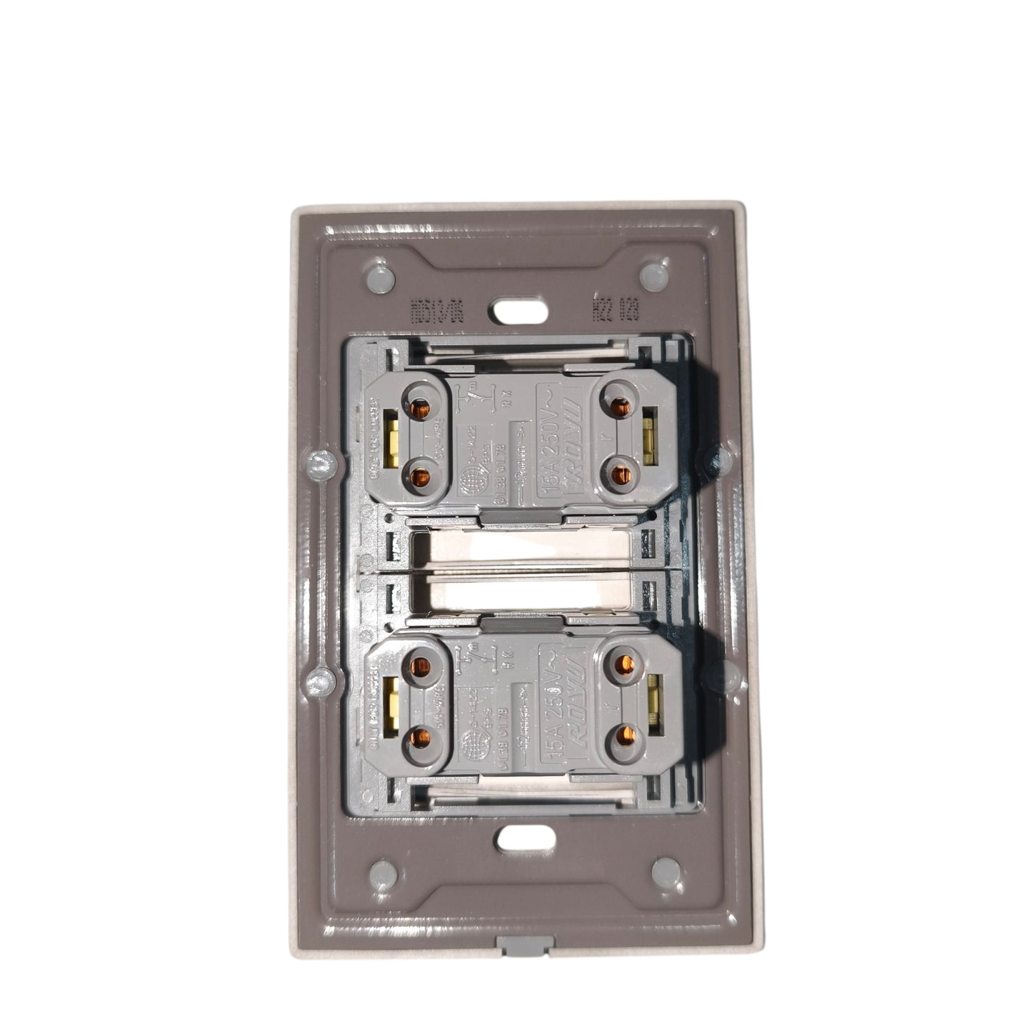A double GFCI outlet cover plate assembly shown from the back, featuring two silver electrical outlets with gold and red grounding screws inside a gray plastic backplate.