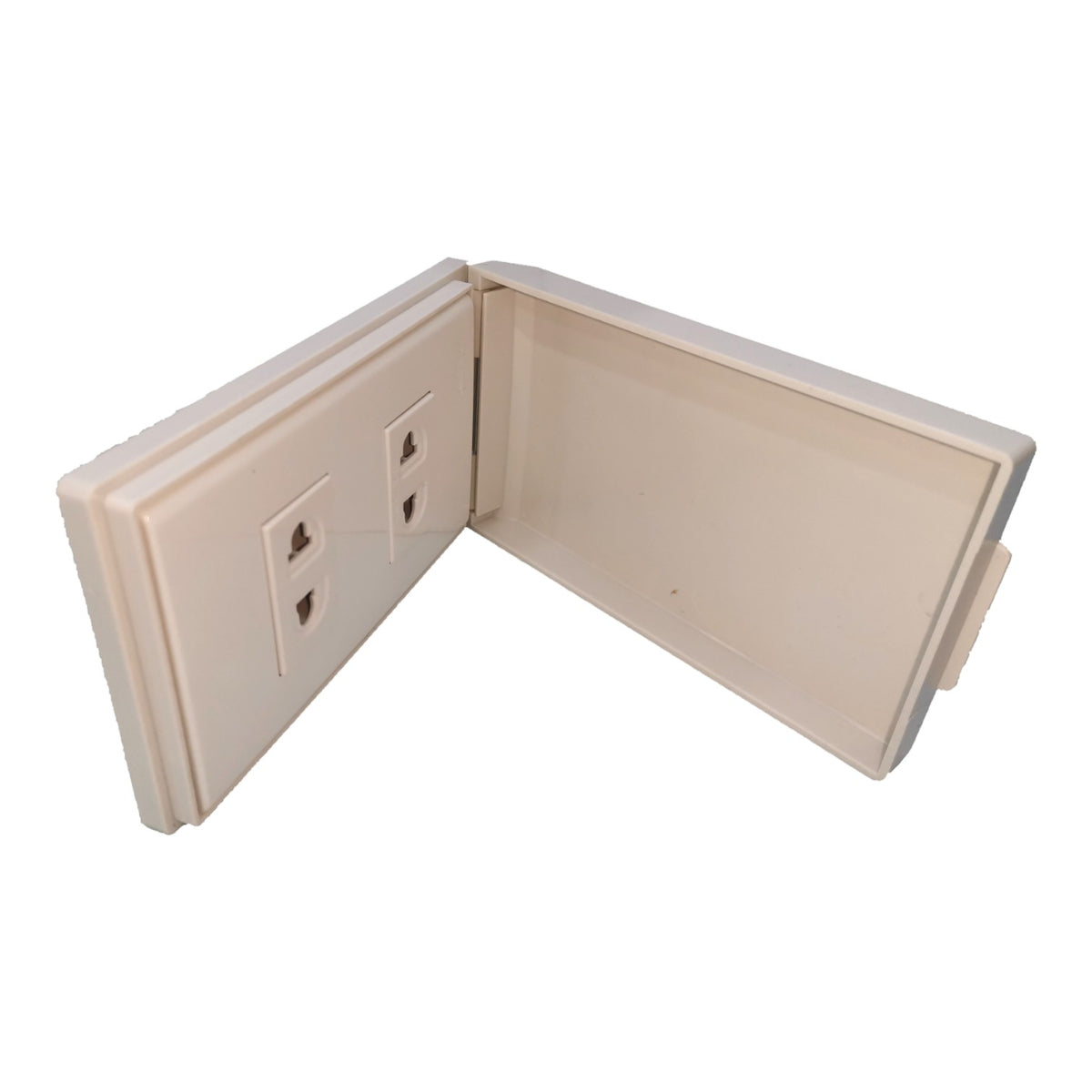 A cream-colored plastic modular wall outlet cover plate, shown open to display both the front face with two UK three-pin sockets and the back panel, set against a plain white background.