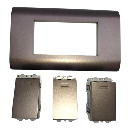 A dark metallic gray panel trim kit containing one large rectangular frame and three matching rectangular mounting blocks, displayed on a clean white background.