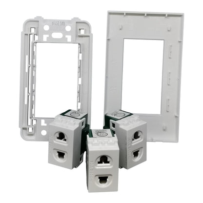 White plastic modular wall switch and outlet components, including two rectangular frame faces and three terminal blocks, shown on a plain white background.
