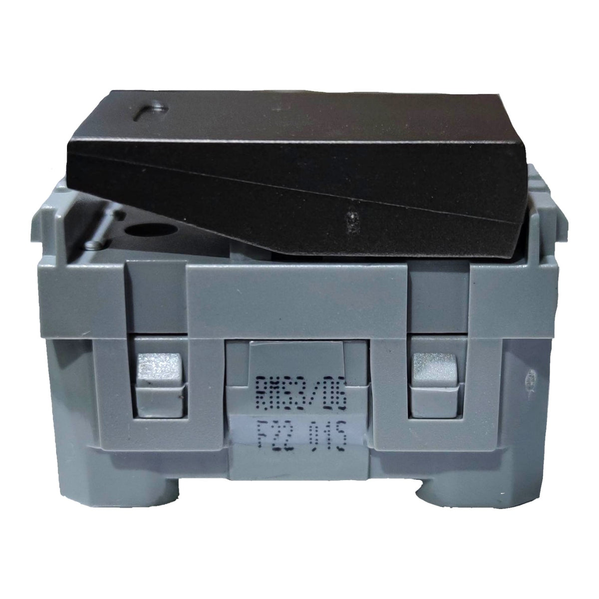 A gray plastic electrical component or fuse holder with a black top cover, featuring embossed serial numbers 'RH50/DG' and 'F22 015' on the front, isolated on a white background.