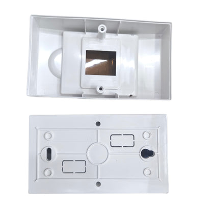Two white wall-mounted electronic devices on a white background