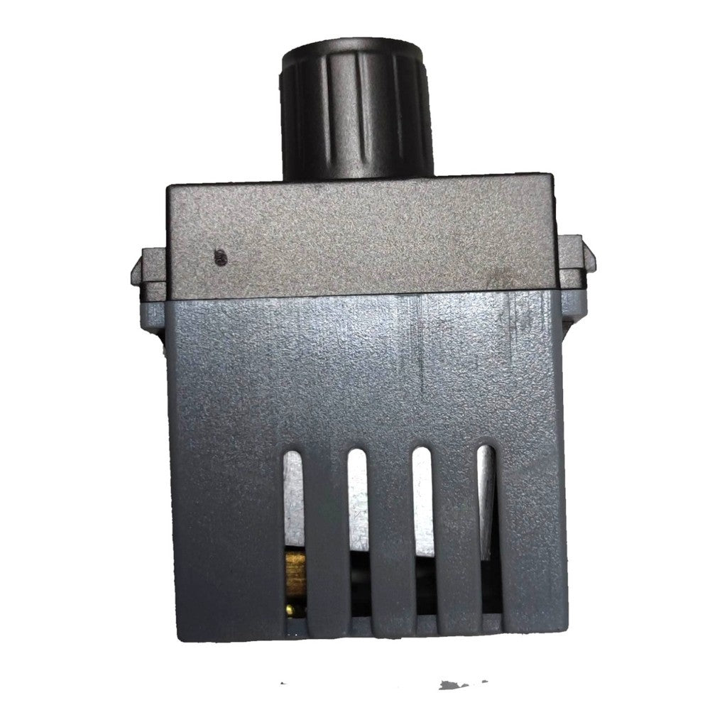 A dark gray plastic electronic control module with a black rotary knob on top, photographed against a plain white background.
