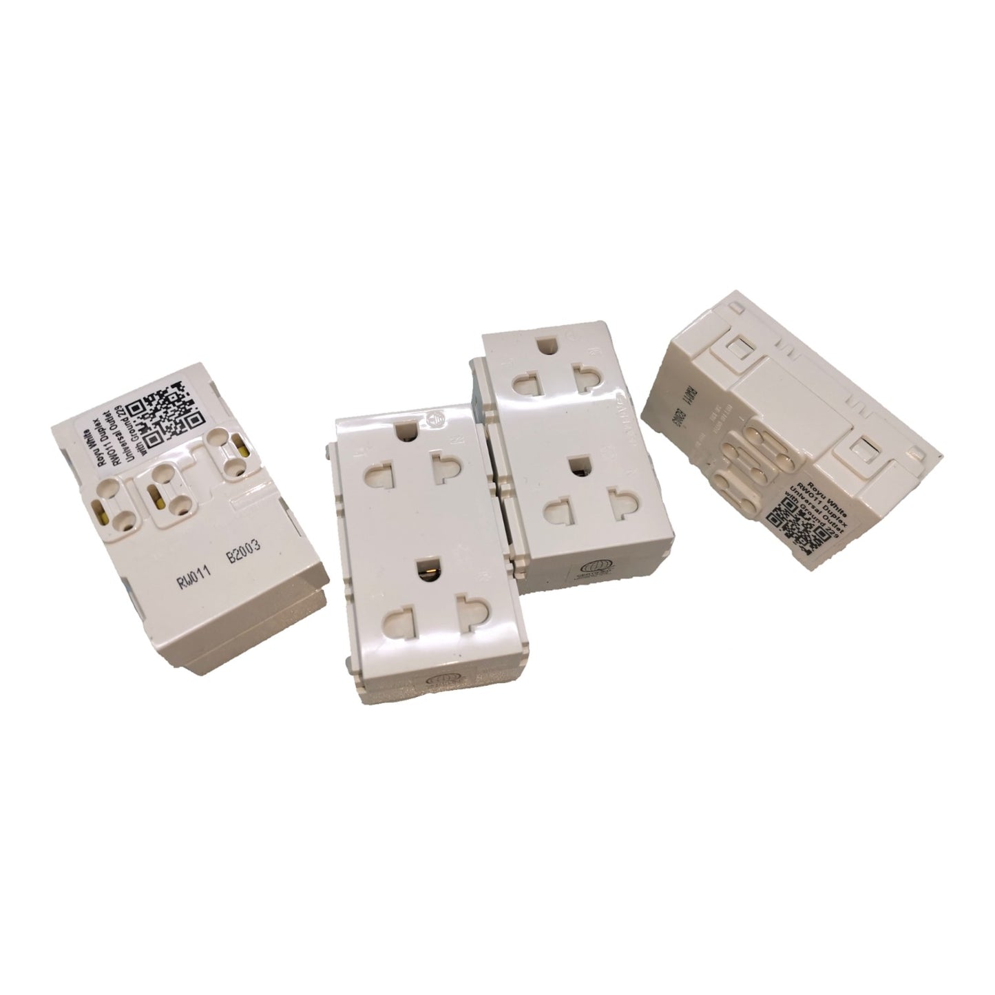 Four small beige electrical outlet modules or connectors shown on a plain white background, with printed labels and QR codes on some units.