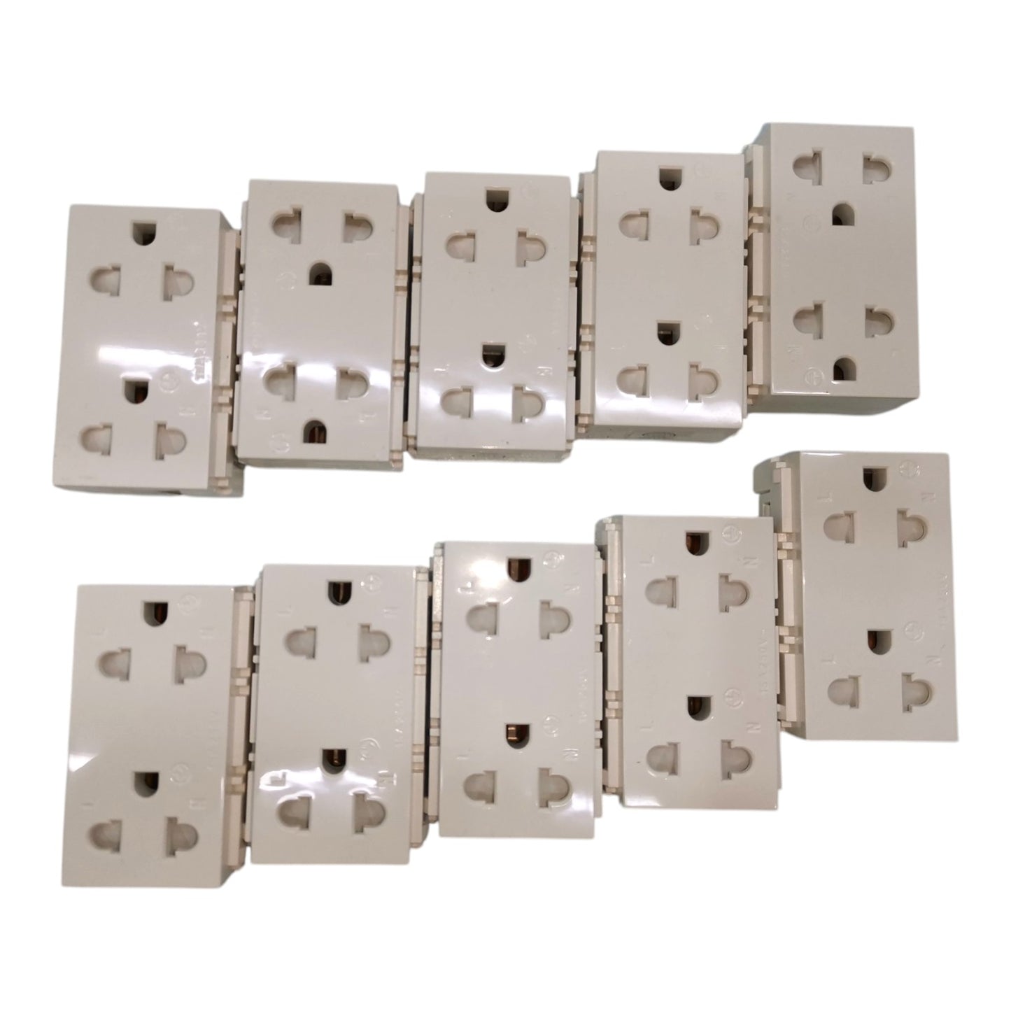 Six beige wall outlet blocks arranged in two rows on a plain white background.