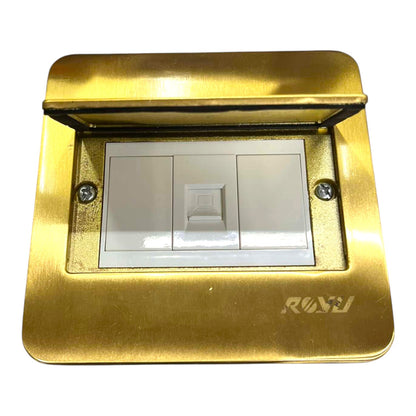 A modern three-way light switch plate in brushed gold brass with a white switch panel inside, featuring a hinged top cover and the brand name 'ROWJ' printed on the bottom right.