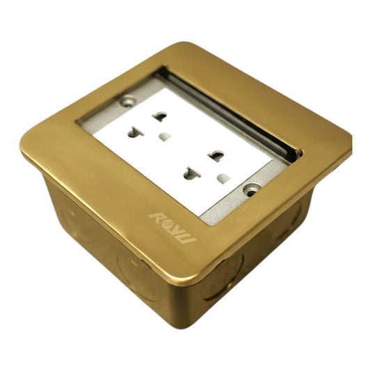 A square gold metal electrical outlet cover plate with a white three-hole US-style outlet insert, shown on a plain white background. The brand name 'ROVI' is embossed on the front.