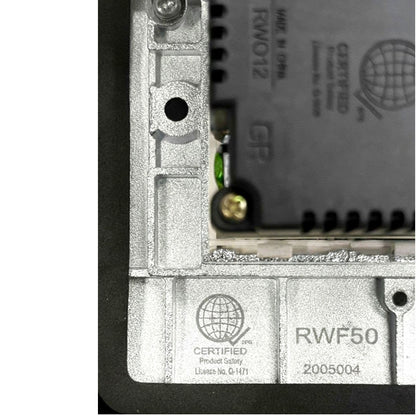 Close-up of a metallic industrial electronic component with printed text including 'RWF50', 'Certified Product Safety', and 'Made in Germany'.