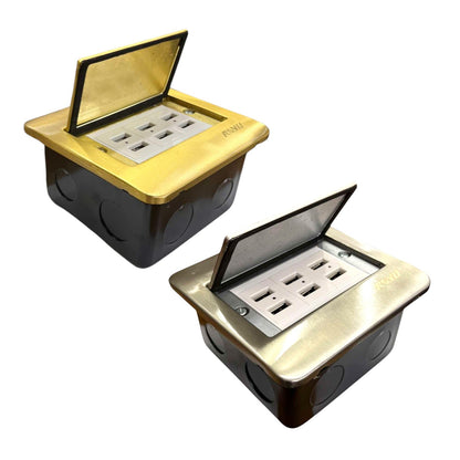 Two industrial electrical outlet boxes shown on a white background, one from a top view and one from a front-three-quarter view. The boxes feature a black plastic housing, a brushed gold metal top cover, and an open silver metal lid revealing multiple electrical outlets.