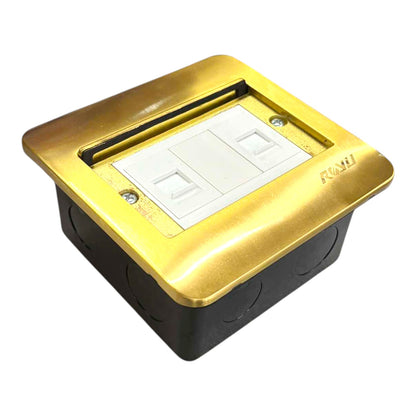 A modern dual G13 plug-in socket outlet cover with a brushed gold metal top plate, a white double G13 socket face, and a black plastic base box, shown on a plain white background.