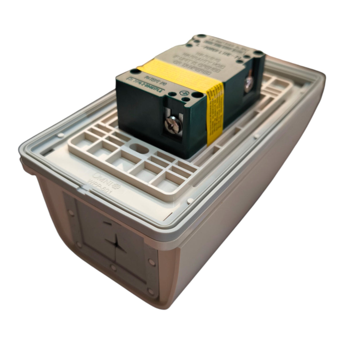 An electrical component, specifically a Siemens SIMATIC S7 analog input module, mounted on top of a gray plastic junction box against a white background.