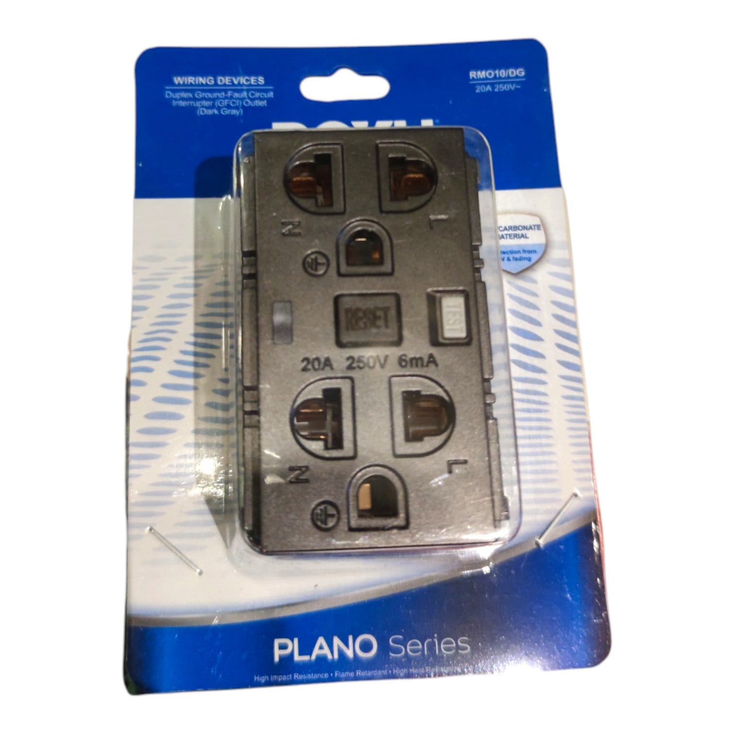A 3-outlet duplex power strip in its original retail blister packaging. The power strip is dark gray/black plastic with three standard US electrical outlets and small red polarity indicators.