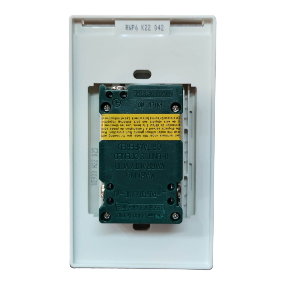 A marine electrical marine contactor with a dark green coil and a yellow warning label, housed in a white plastic faceplate.