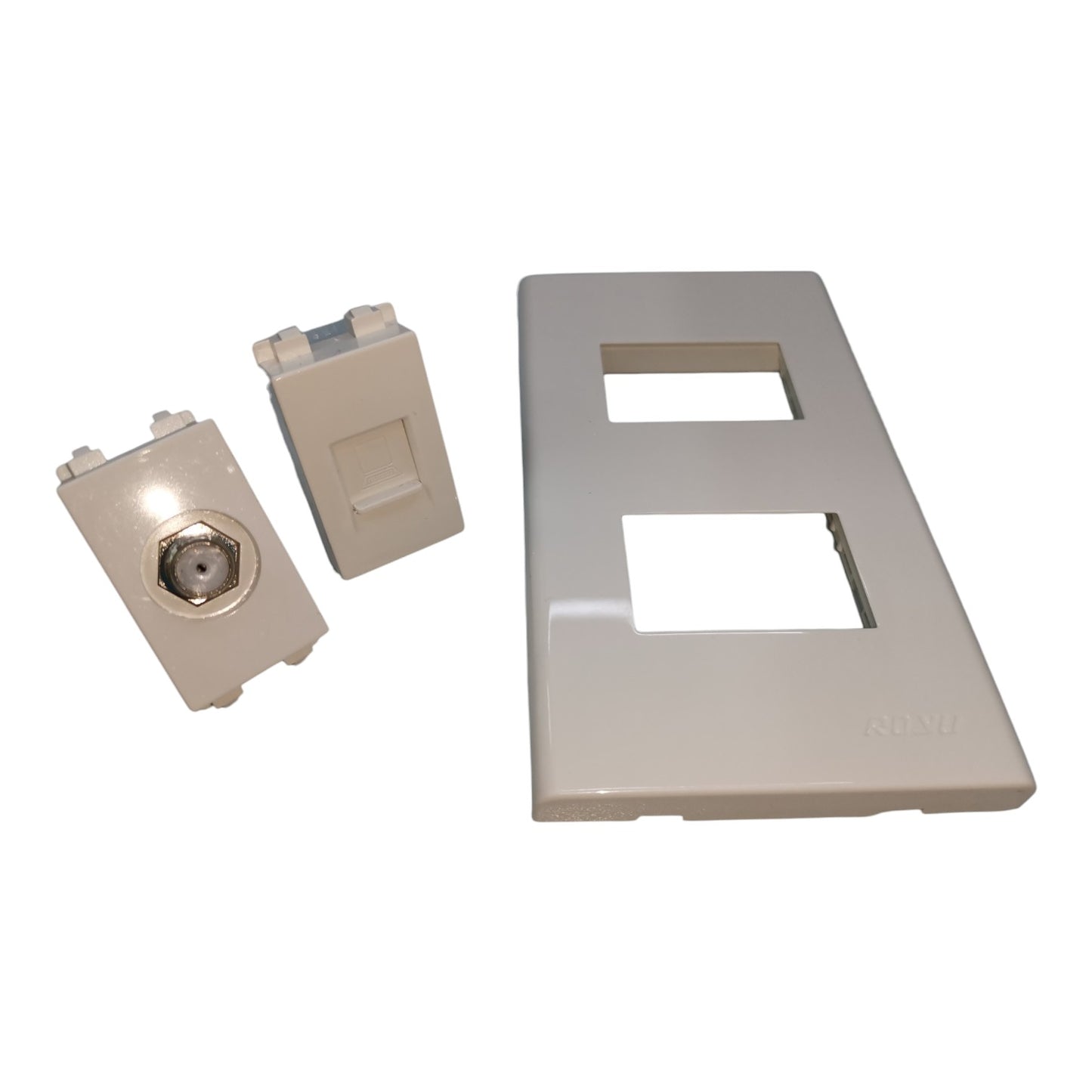 A set of beige plastic electrical wall switch components, including a double-switch faceplate and two individual switch modules, shown on a plain white background.
