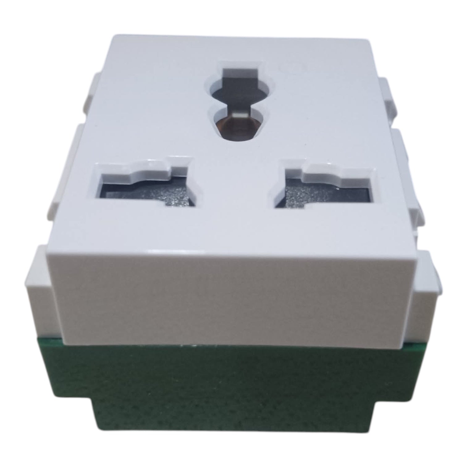 A white plastic multi-socket wall outlet cover with a green textured base, shown on a plain white background.